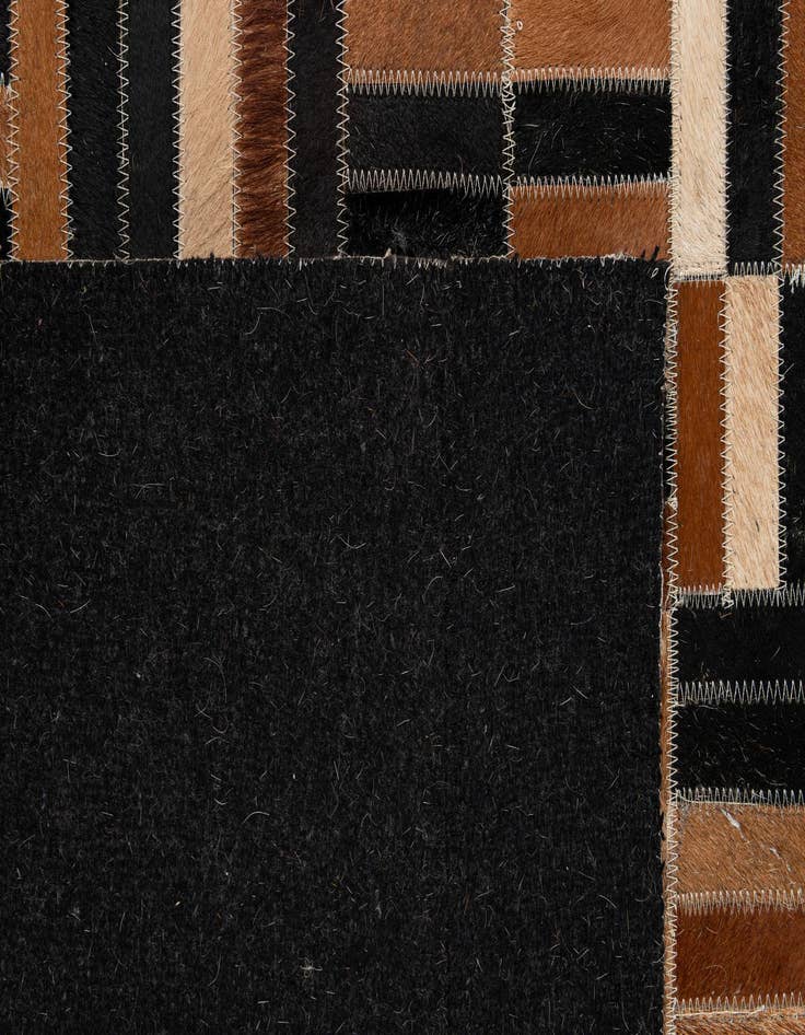 Detail image of 4' 11 x 8' 1 Cowhide - Patchwork Rug