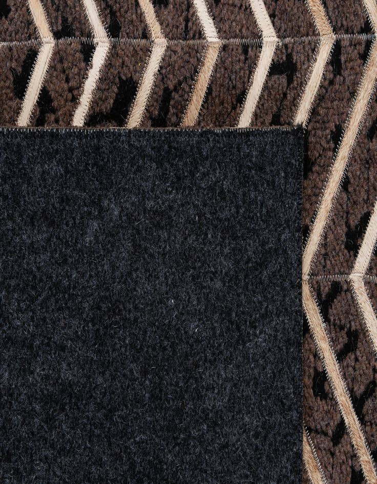 Detail image of 5' x 7' 11 Cowhide - Patchwork Rug