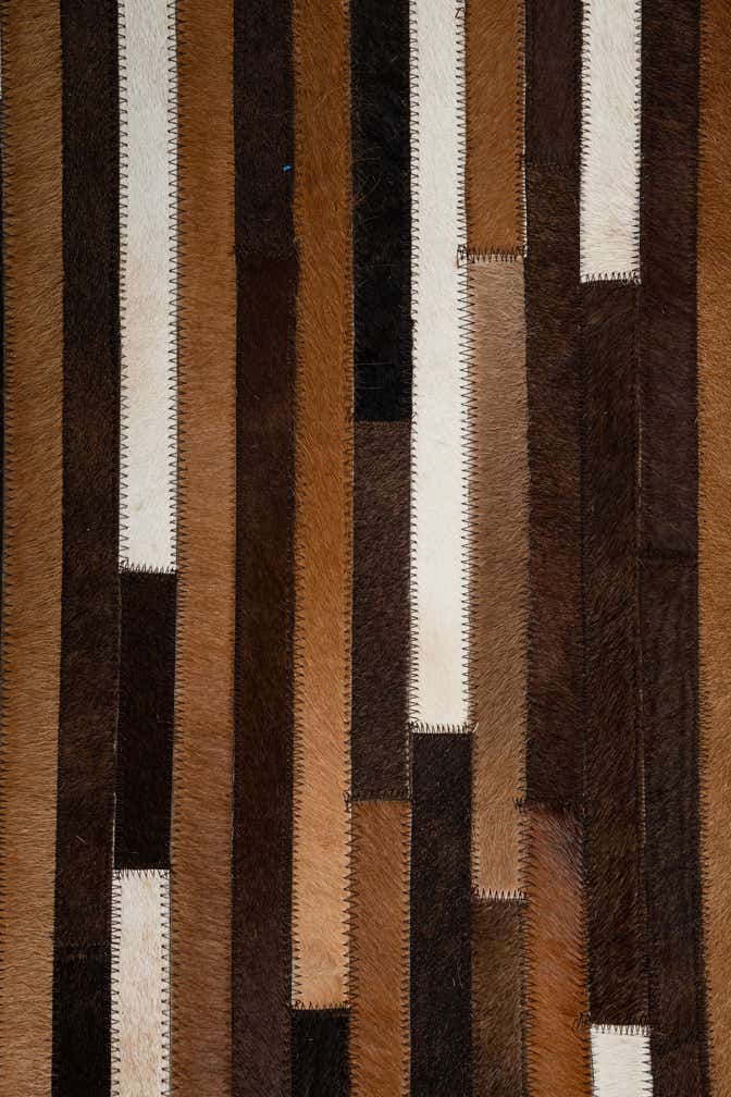 5' 1 x 7' 10 Cowhide Leather Rug