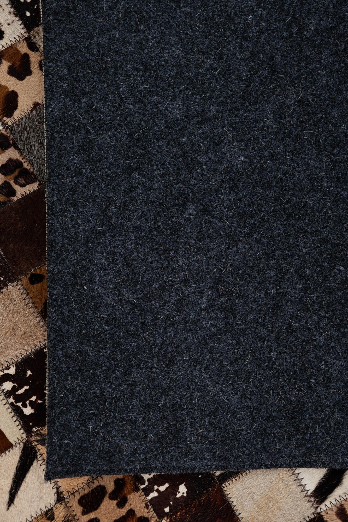 5' 1 x 8' 1 Cowhide Leather Rug