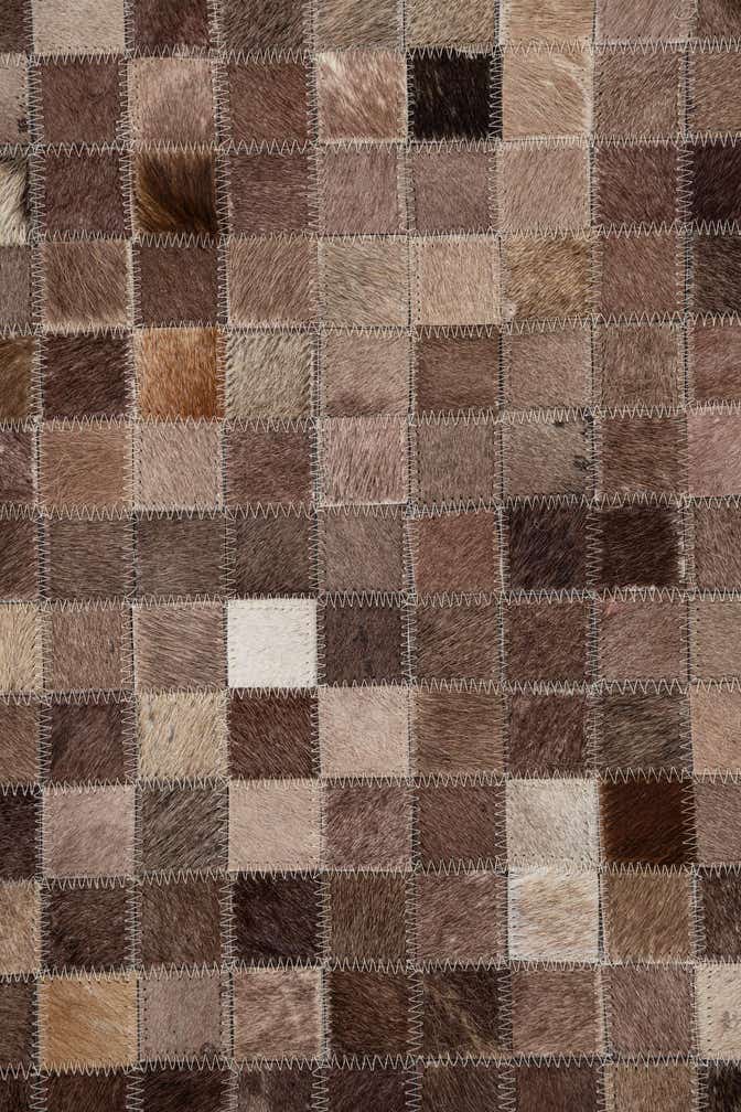 5' 1 x 8' 1 Cowhide Leather Rug