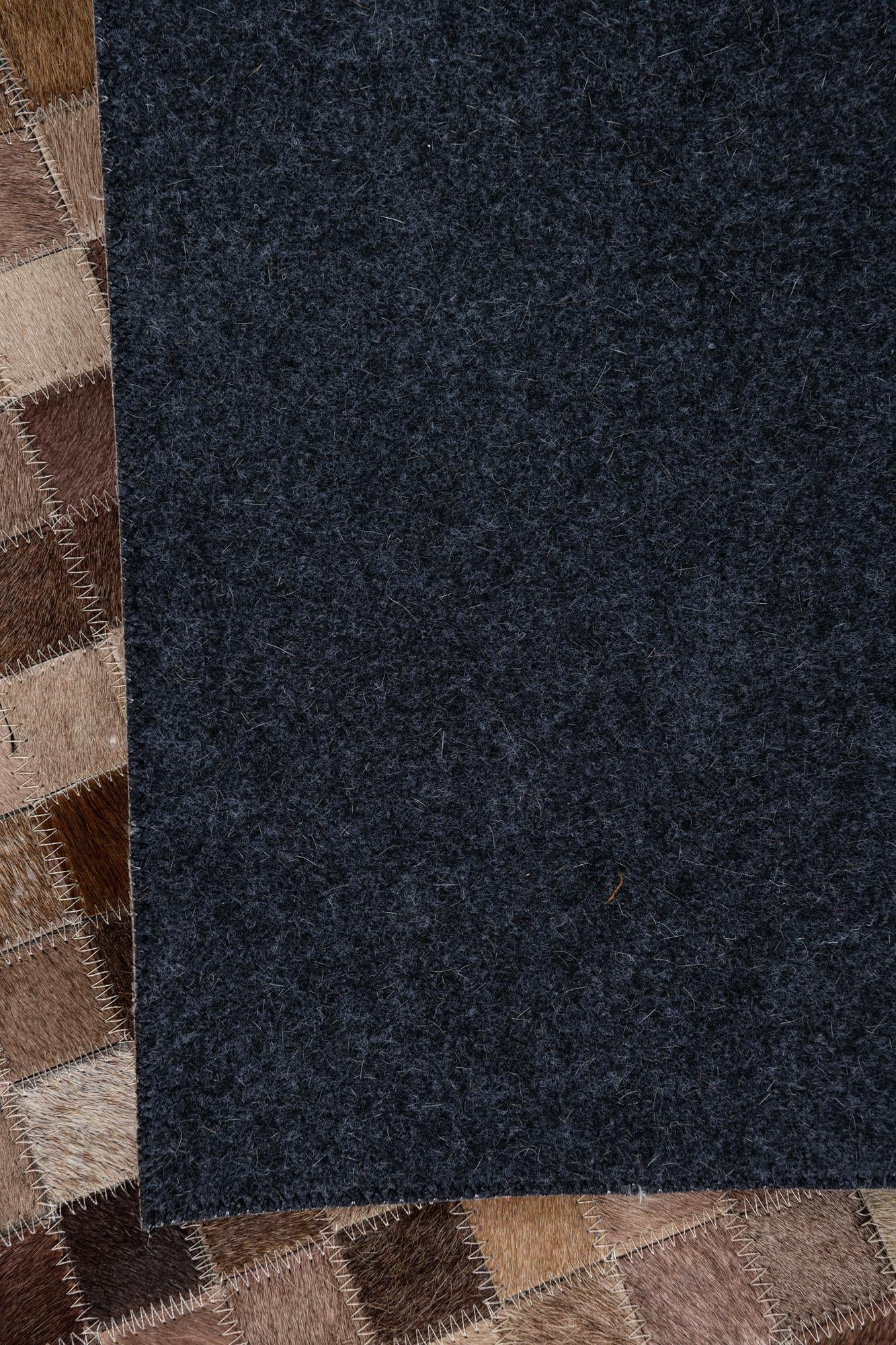 5' 1 x 8' 1 Cowhide Leather Rug