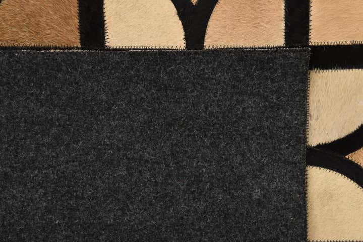 5' x 7' 9 Cowhide Rug