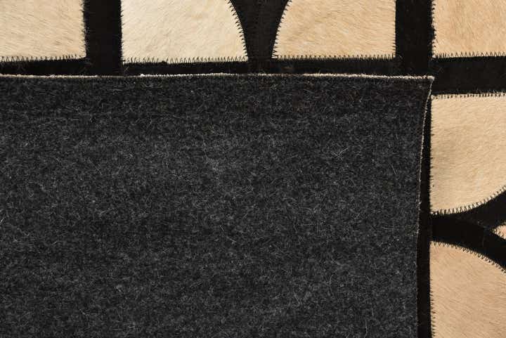5' x 7' 8 Cowhide Rug