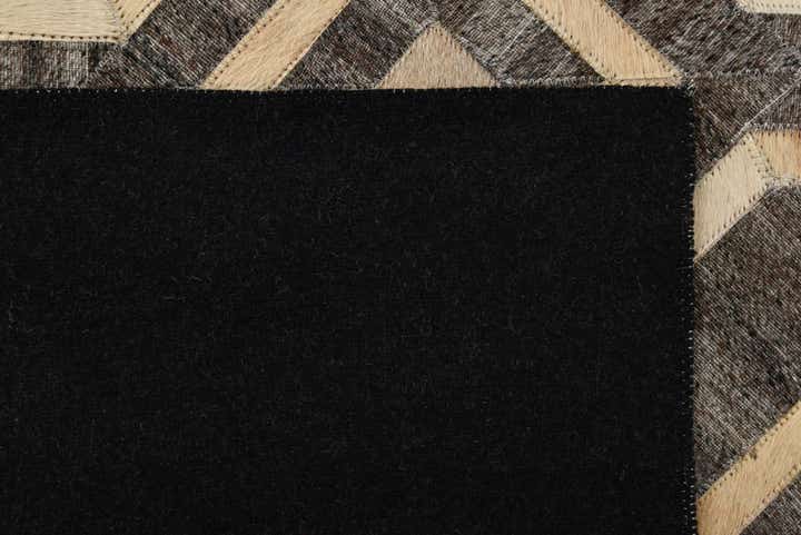 5' x 7' 8 Cowhide Rug