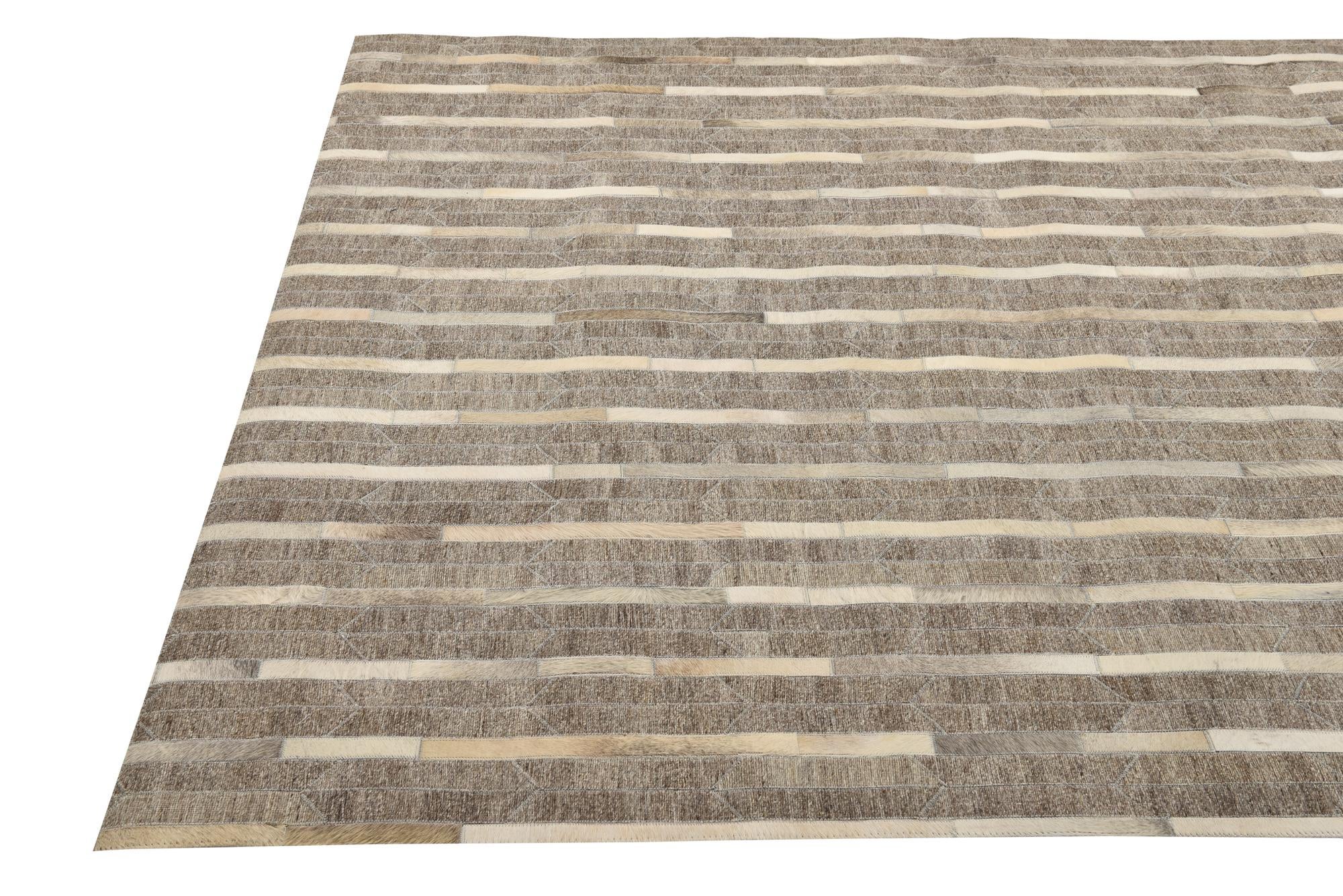 5' 1 x 7' 10 Cowhide Rug