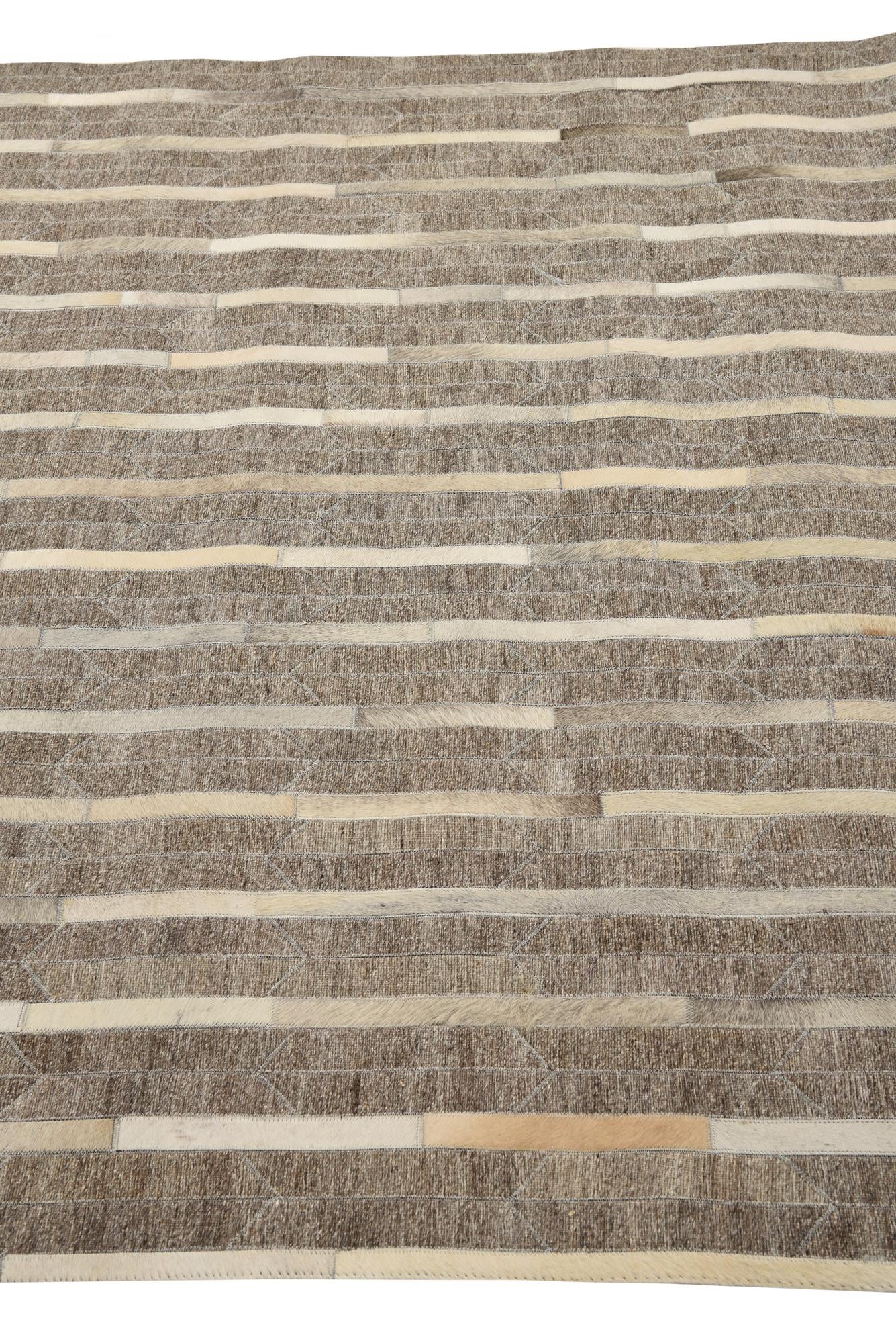 5' 1 x 7' 10 Cowhide Rug