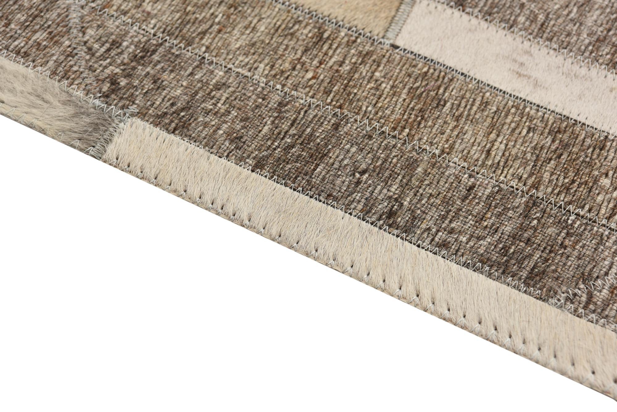 5' 1 x 7' 10 Cowhide Rug
