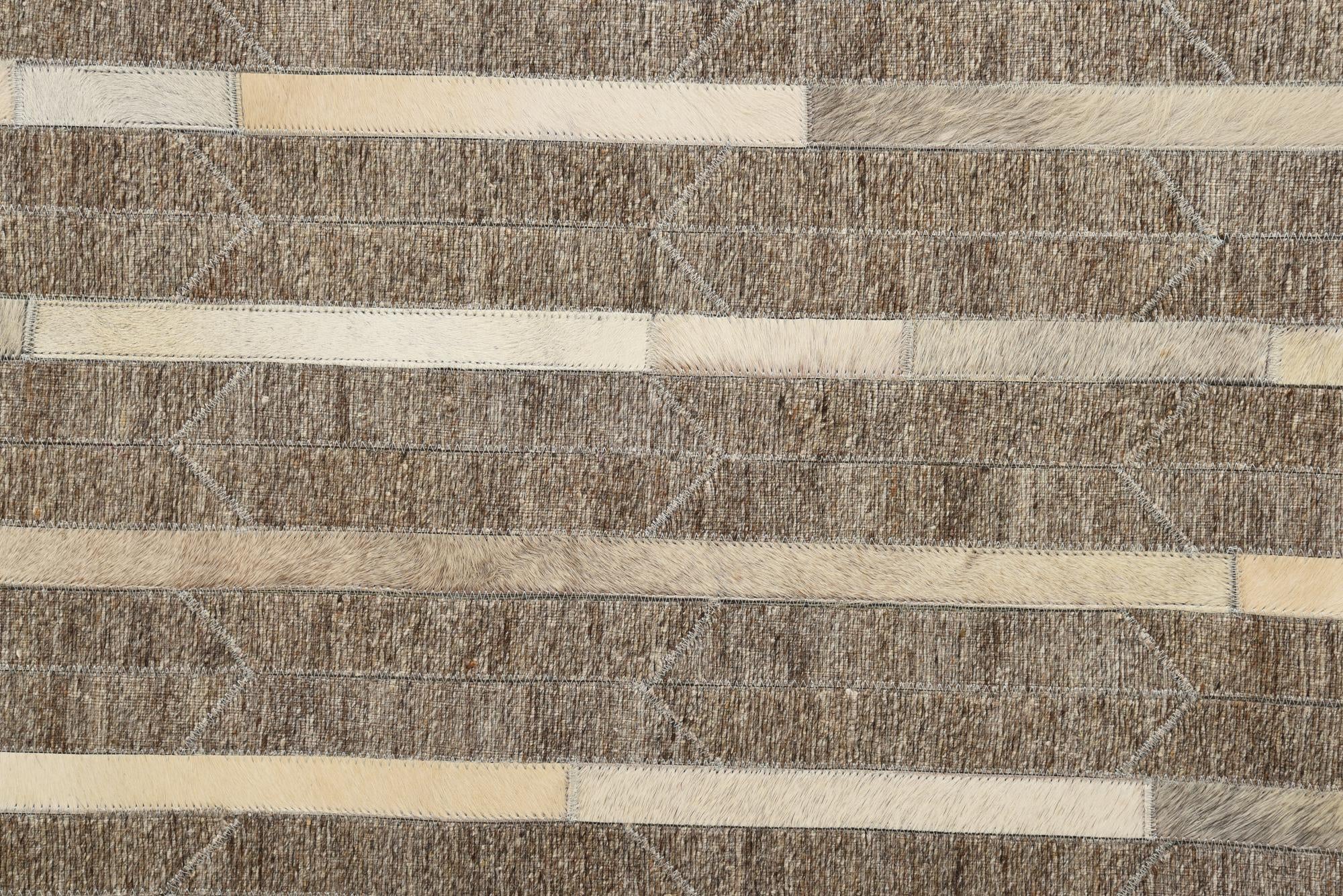 5' 1 x 7' 10 Cowhide Rug
