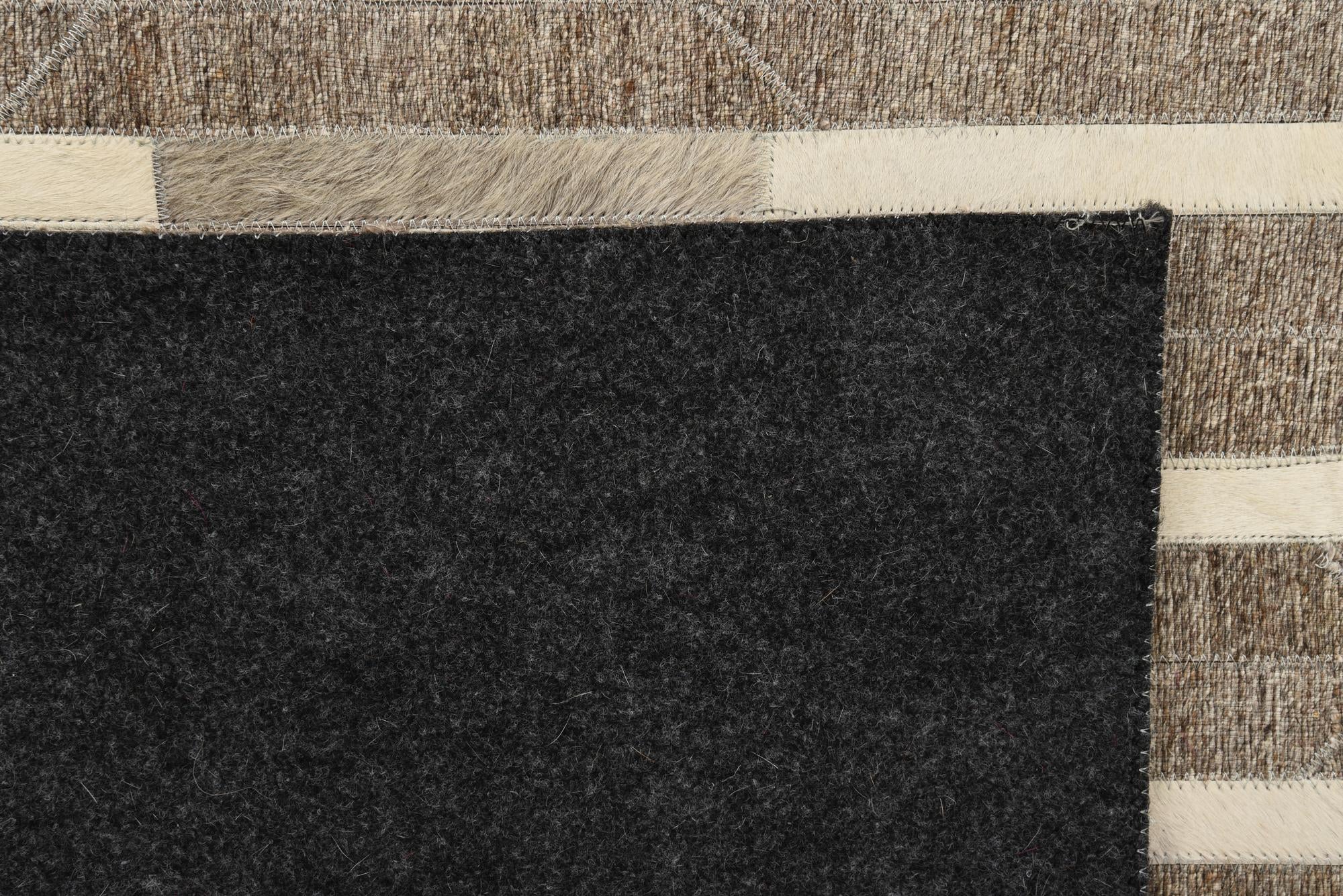 5' 1 x 7' 10 Cowhide Rug