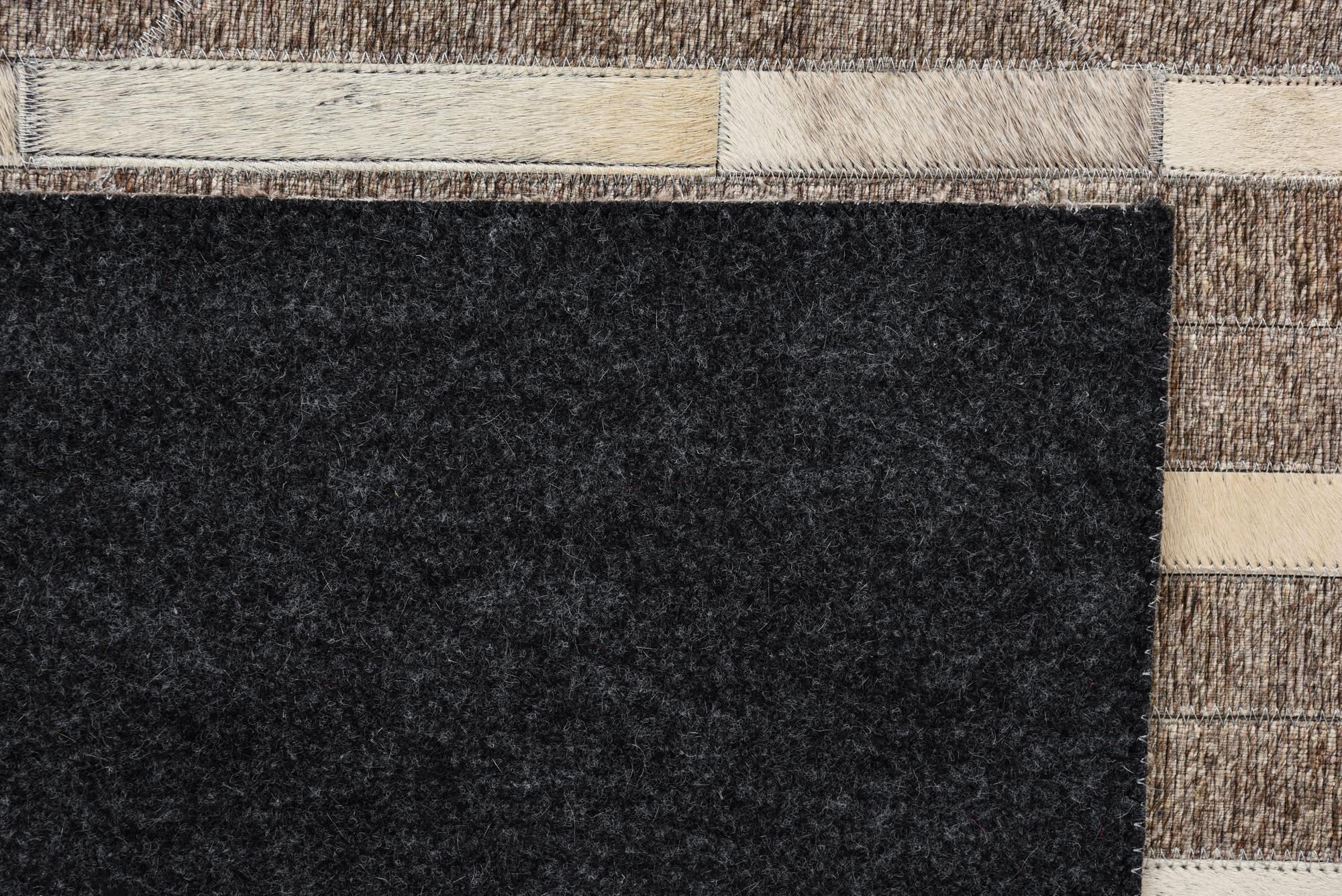 5' 1 x 7' 10 Cowhide Rug