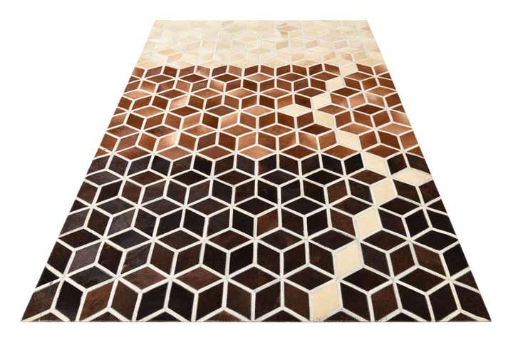 5' 2 x 7' 10 Cowhide Rug