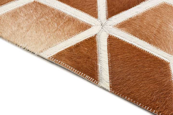 5' 2 x 7' 10 Cowhide Rug