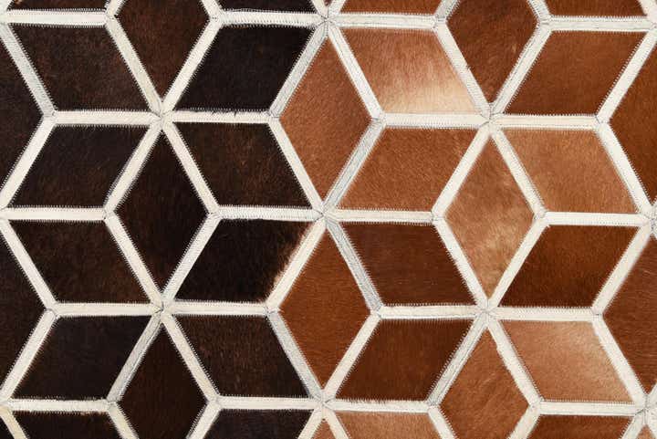 5' 2 x 7' 10 Cowhide Rug