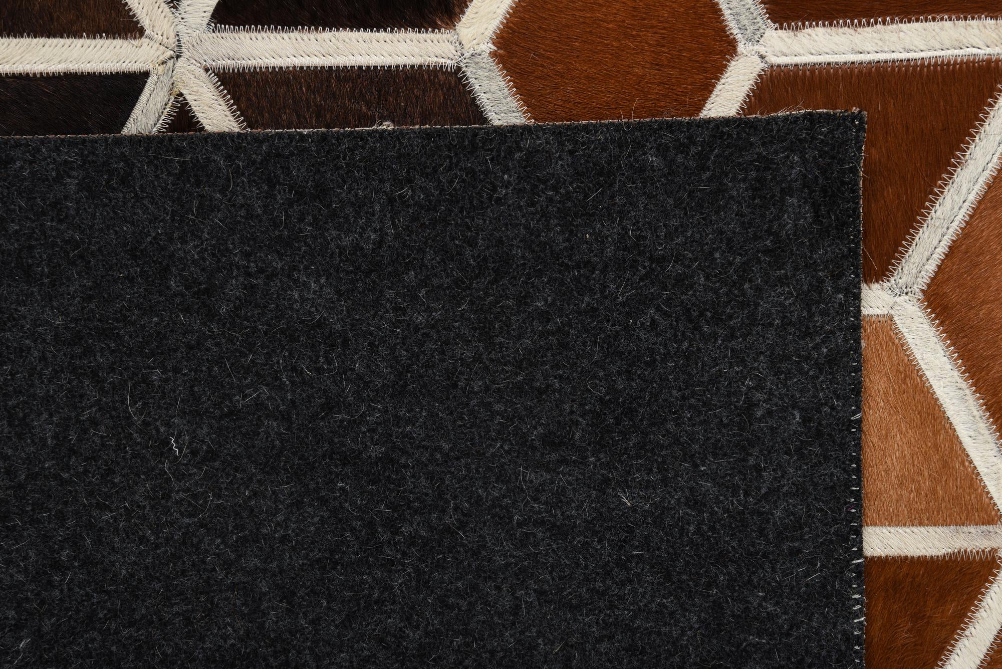 5' 2 x 7' 10 Cowhide Rug