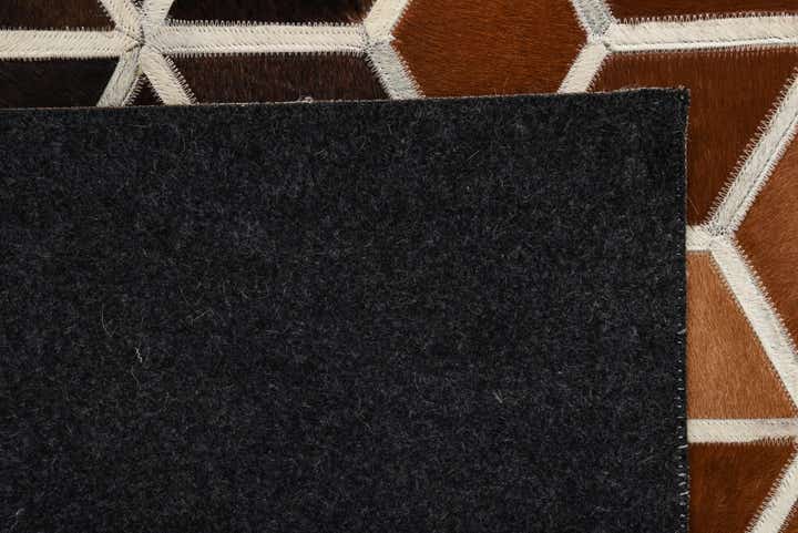 5' 2 x 7' 10 Cowhide Rug