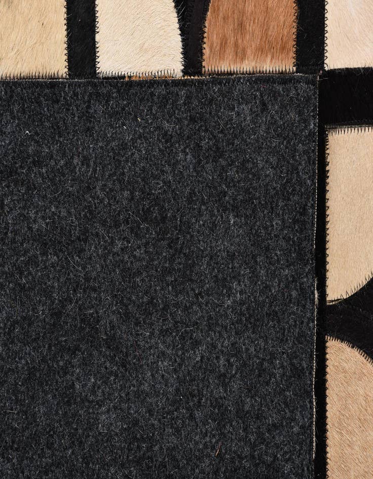Detail image of 5' x 7' 10 Cowhide Rug