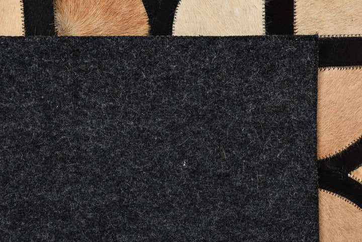 5' x 7' 9 Cowhide Rug