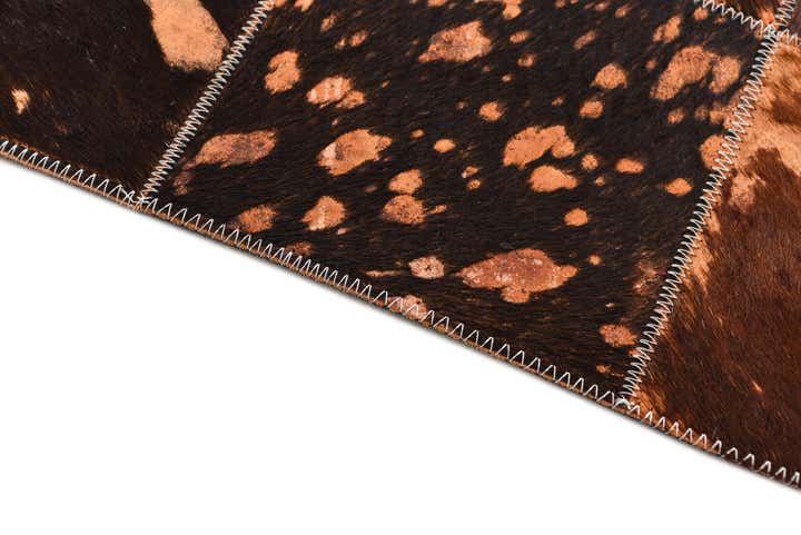 4' 10 x 7' 9 Cowhide Rug
