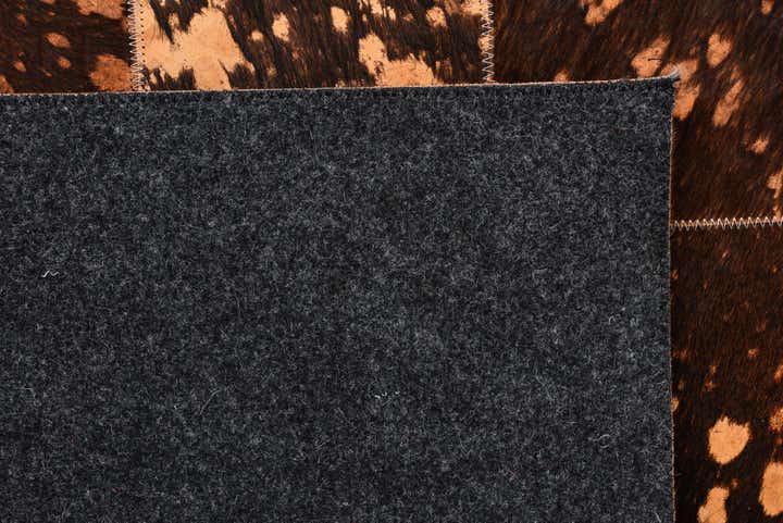 4' 10 x 7' 9 Cowhide Rug