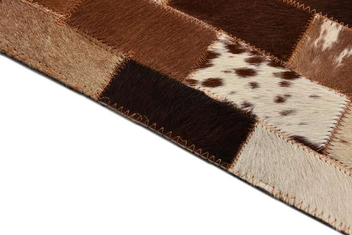 5' 3 x 7' 10 Cowhide Rug