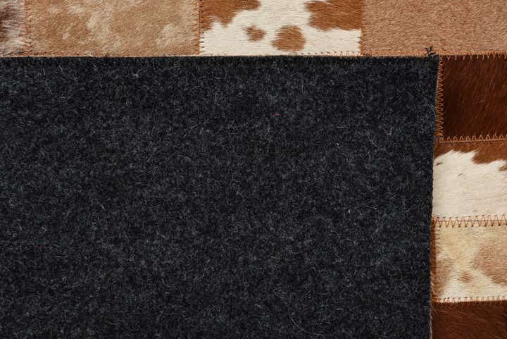 5' 3 x 7' 10 Cowhide Rug