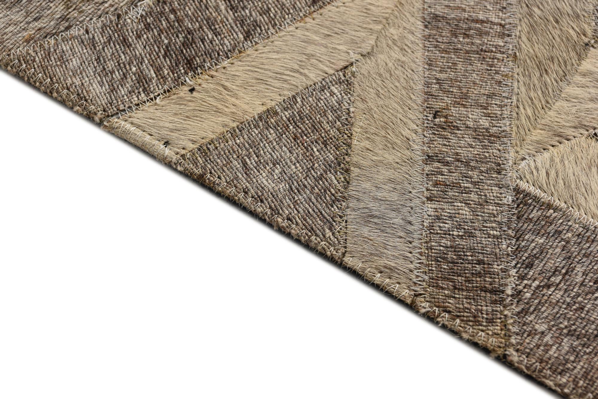 5' 1 x 7' 10 Cowhide Rug