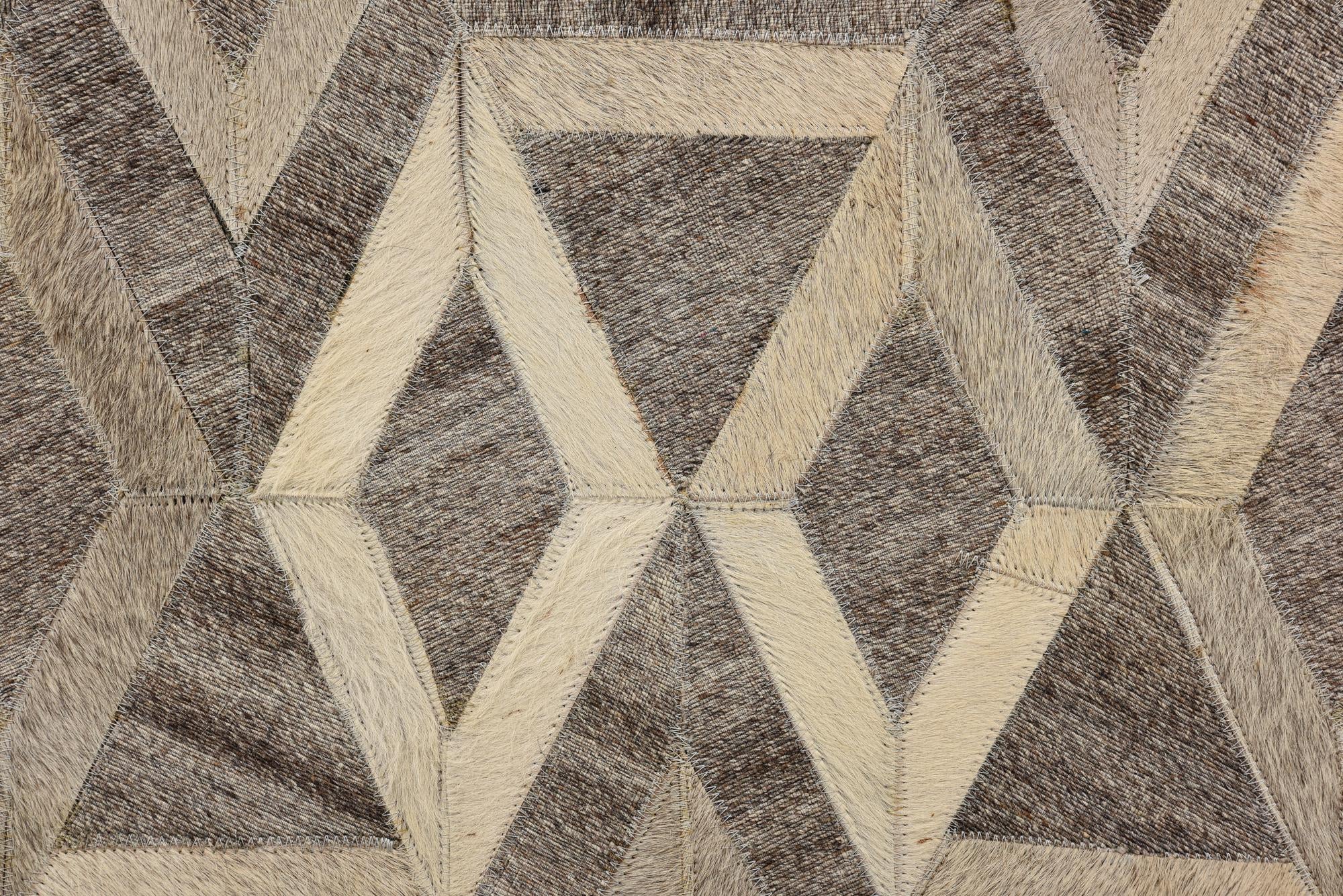 5' 1 x 7' 10 Cowhide Rug