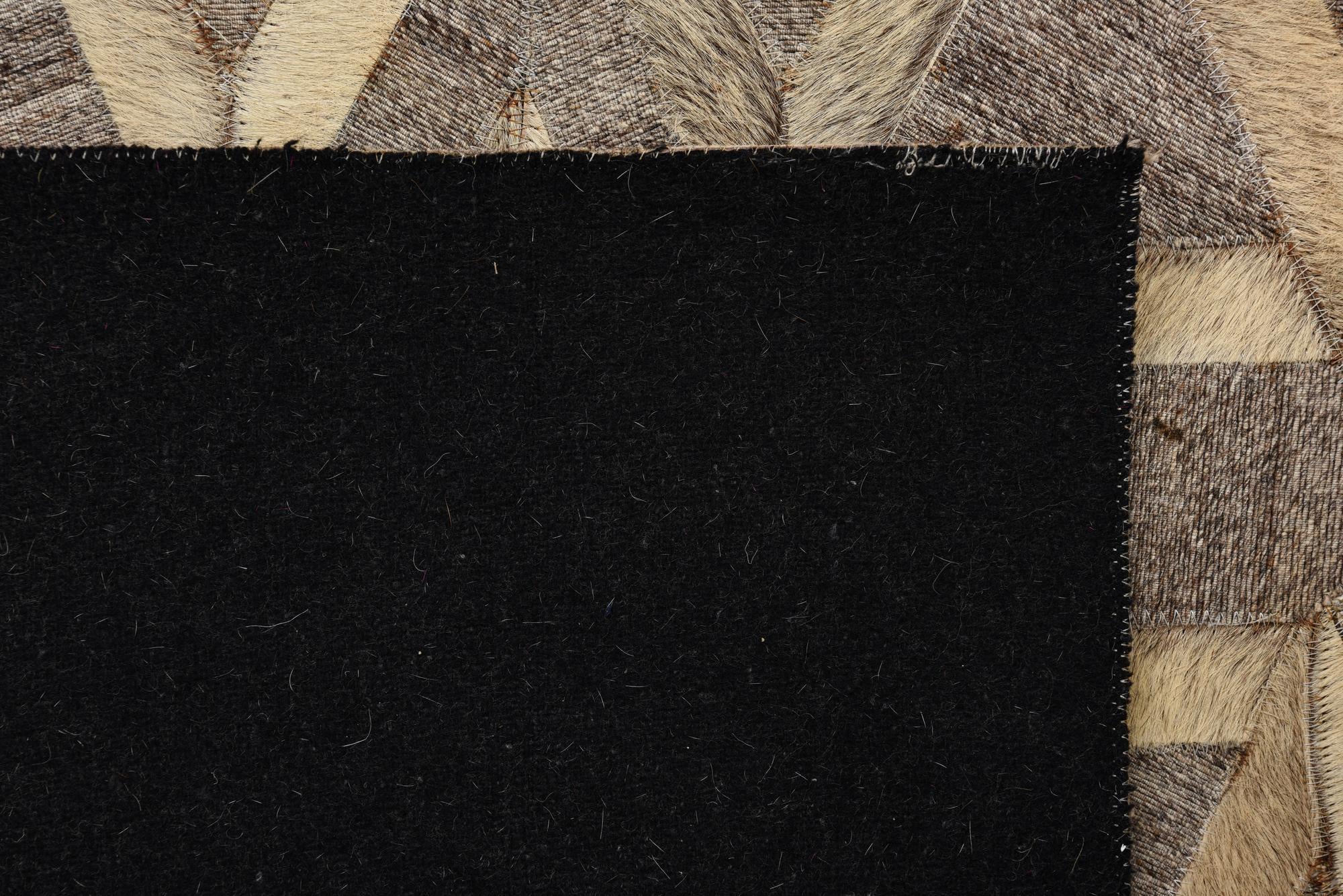 5' 1 x 7' 10 Cowhide Rug