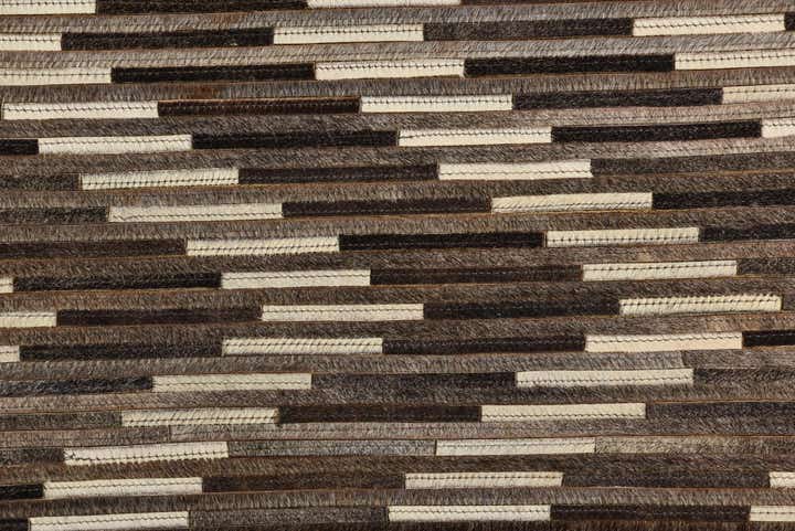 2' 1 x 3' 3 Cowhide Rug