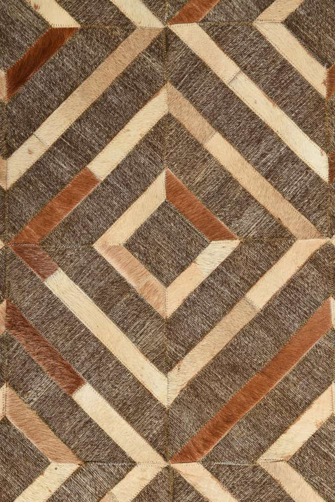 4' 10 x 7' 9 Cowhide Rug