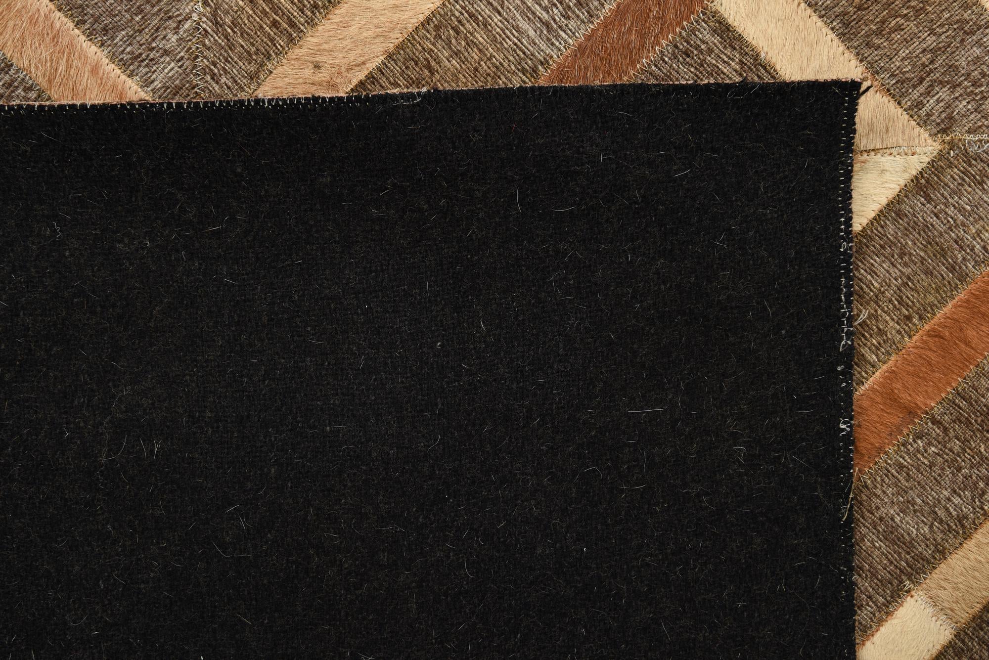 4' 10 x 7' 9 Cowhide Rug