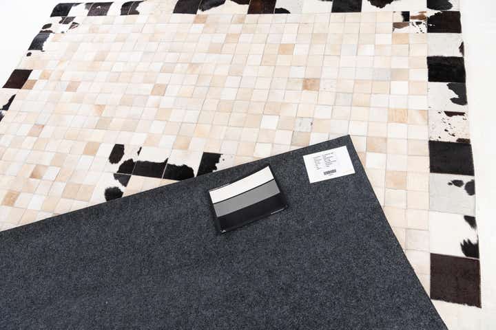 8' x 9' 10 Cowhide Stocks Rug