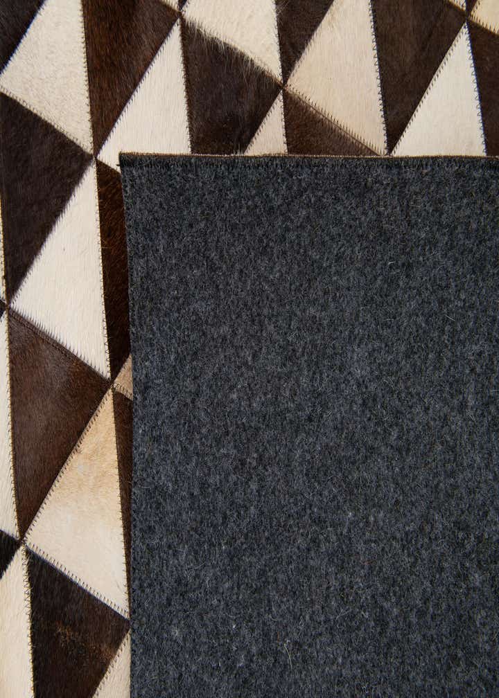 8' 1 x 10' 1 Cowhide Stocks Rug