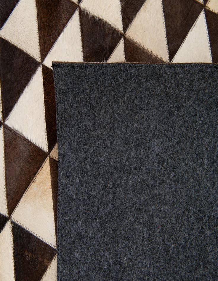 Detail image of 8' 1 x 10' 1 Cowhide Stocks Rug