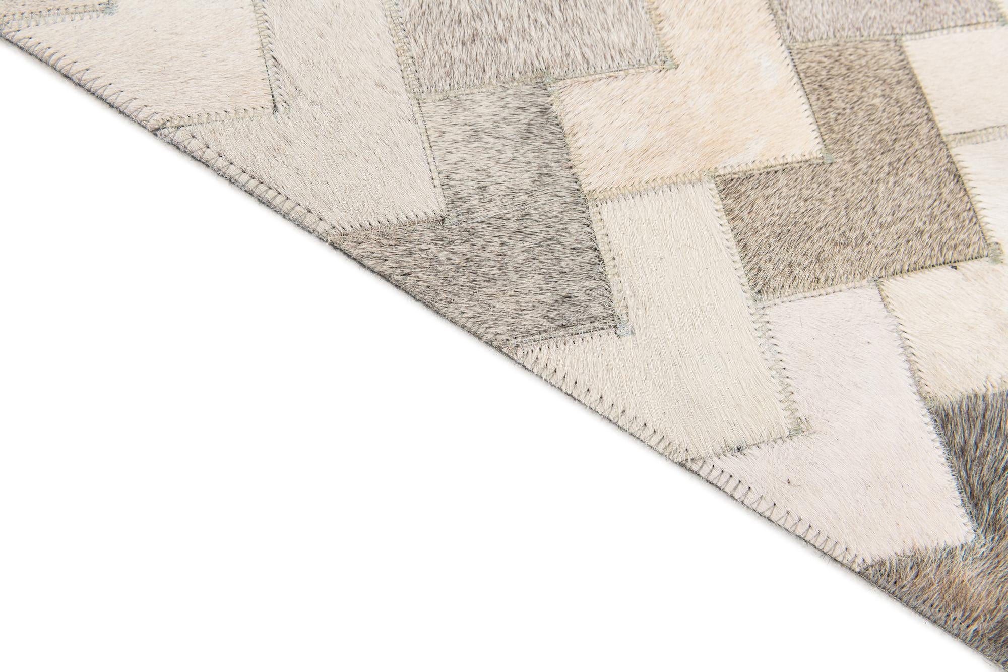 6' x 8' 11 Cowhide Stocks Rug