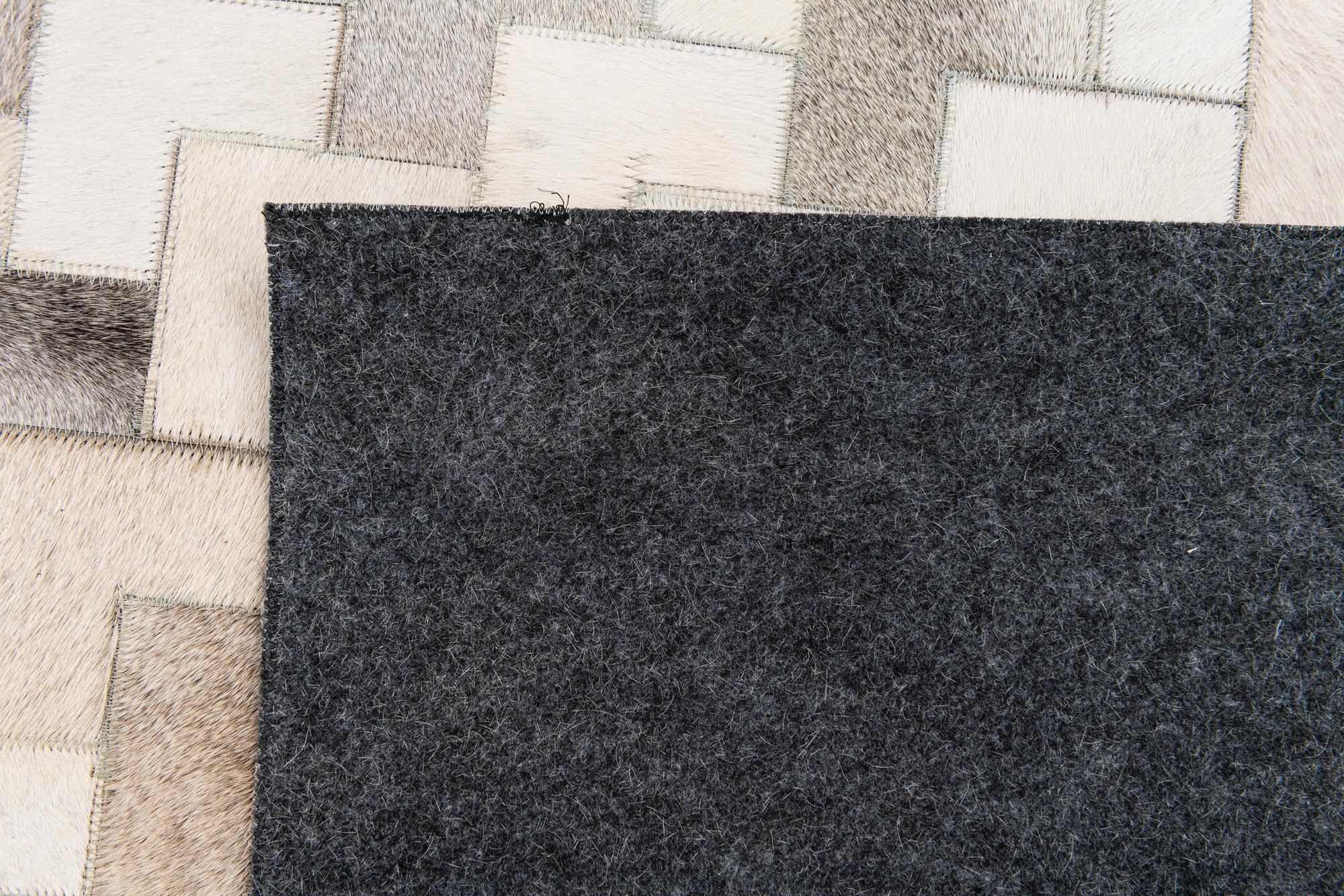 6' x 8' 11 Cowhide Stocks Rug