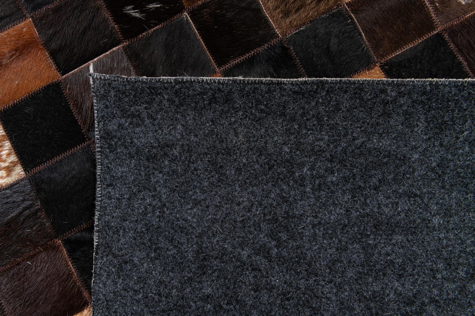 5' x 7' 11 Cowhide Stocks Rug