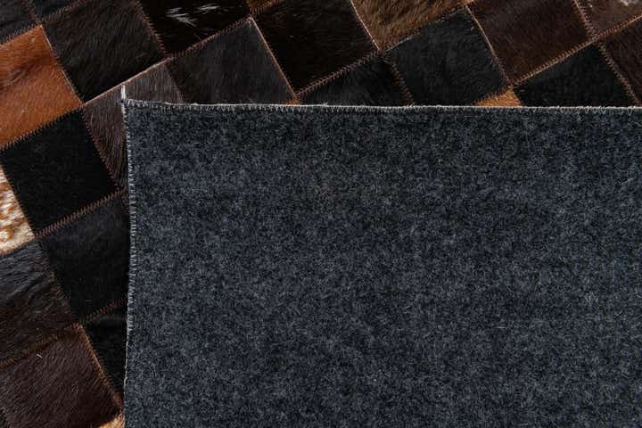 5' x 7' 11 Cowhide Stocks Rug