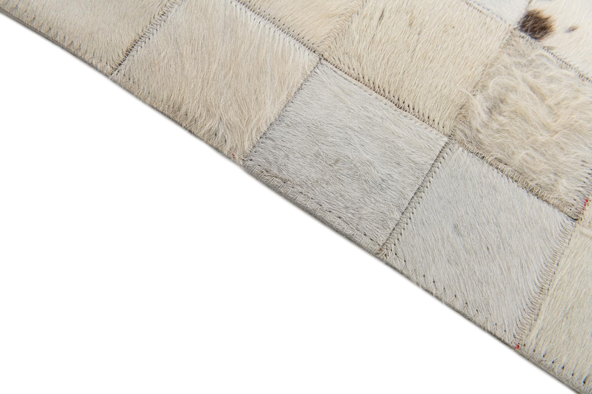 5' x 7' 11 Cowhide Stocks Rug