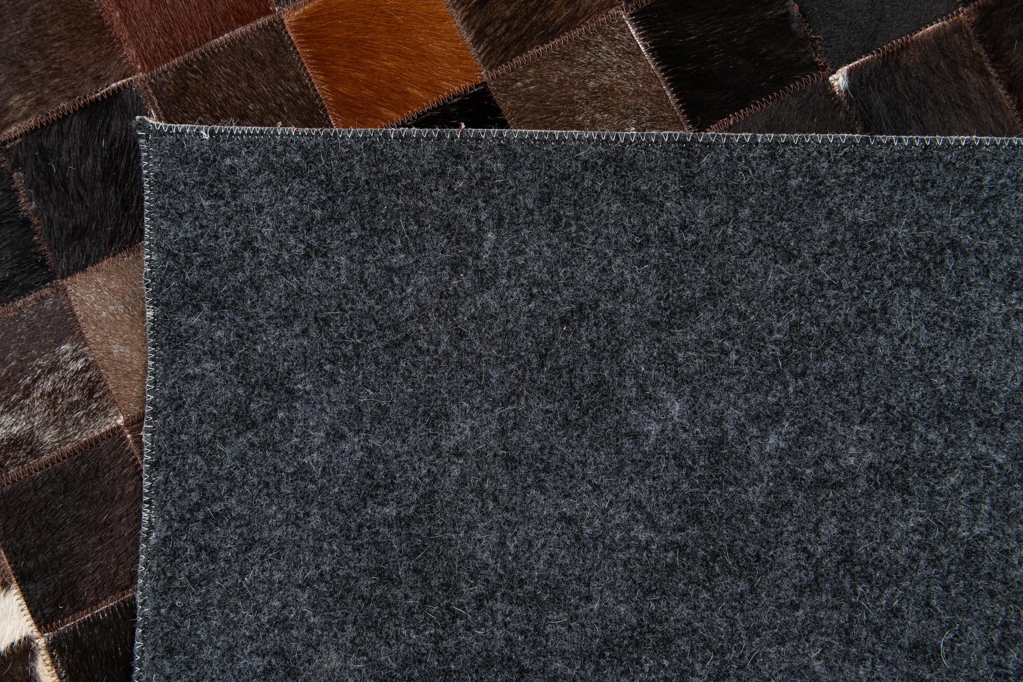 5' x 7' 11 Cowhide Stocks Rug