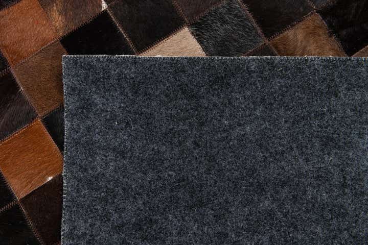 5' x 8' Cowhide Stocks Rug