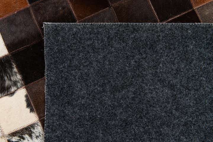 5' x 8' Cowhide Stocks Rug