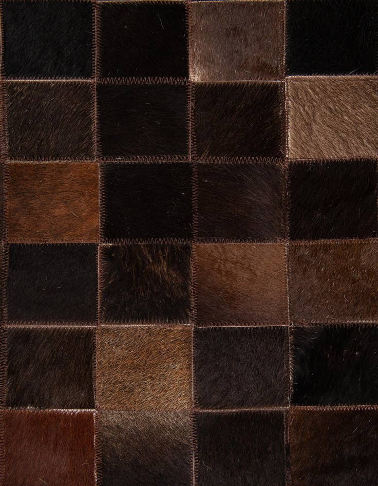 Detail image of 5' x 7' 11 Cowhide Stocks Rug