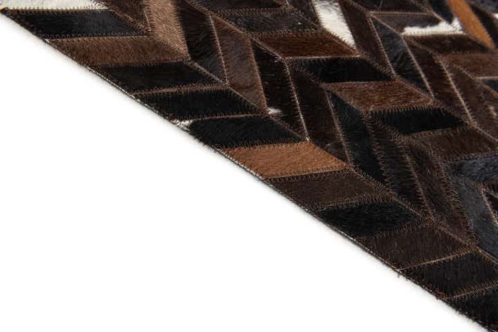 5' x 8' Cowhide Stocks Rug