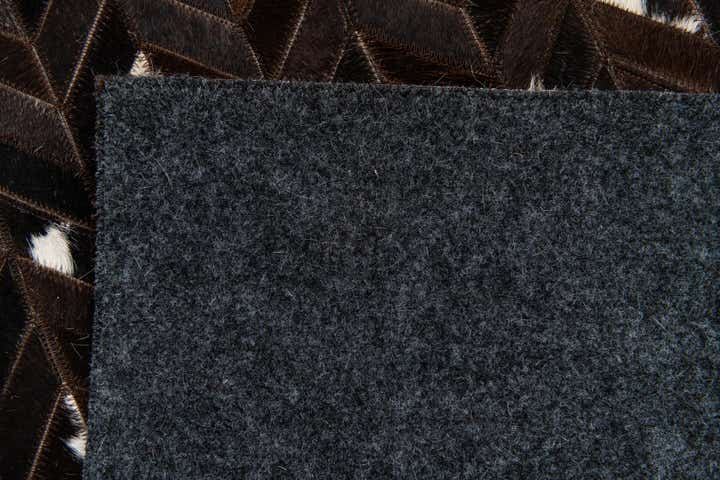 5' x 8' Cowhide Stocks Rug
