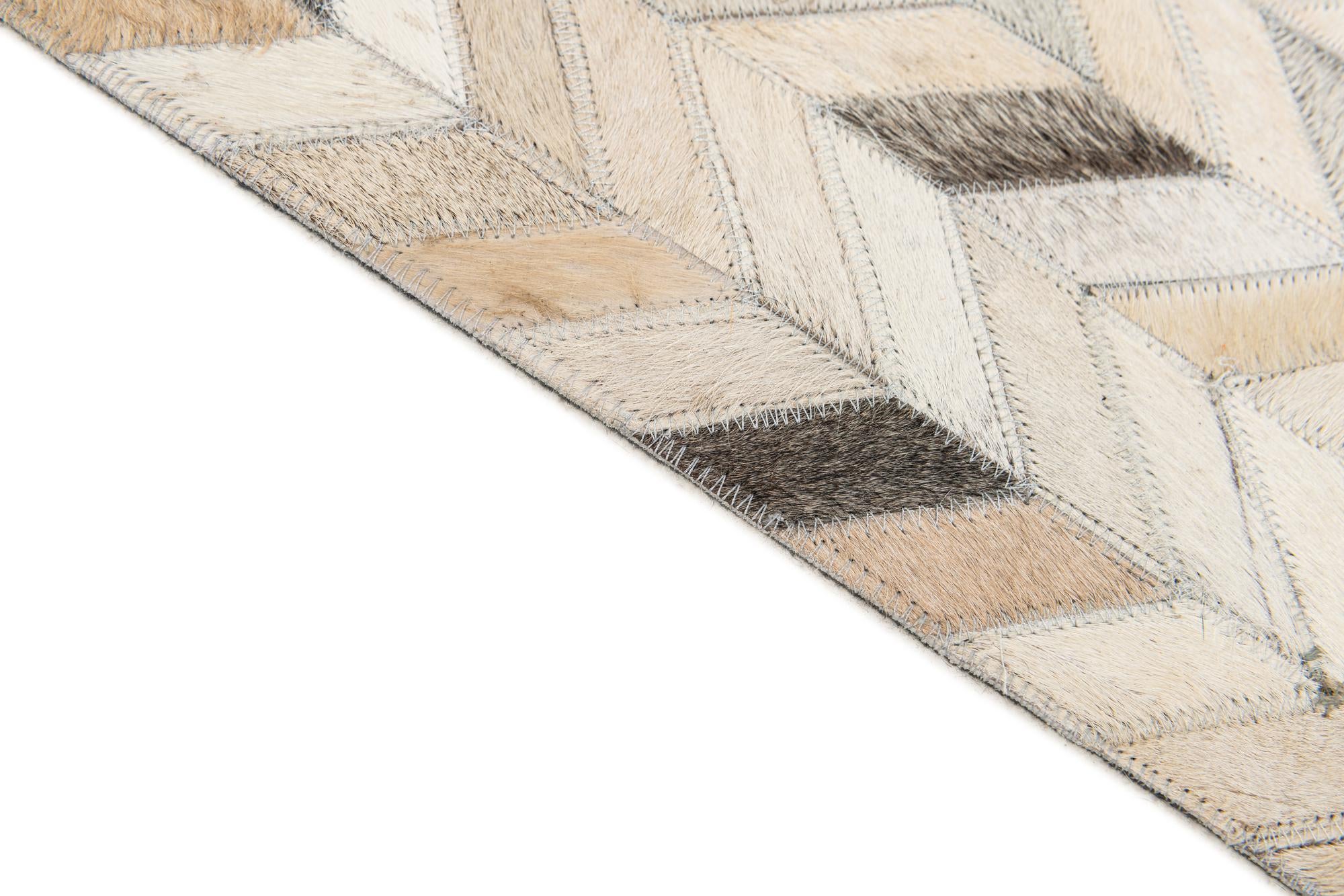 5' 7 x 7' 11 Cowhide Stocks Rug