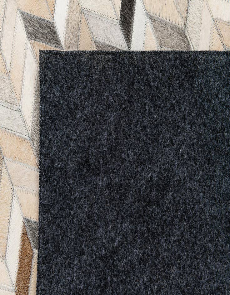 Detail image of 5' 7 x 7' 11 Cowhide Stocks Rug