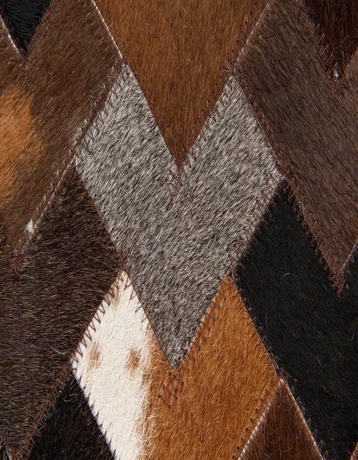 Detail image of 5' x 7' 11 Cowhide Stocks Rug
