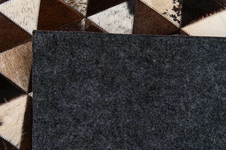 5' x 8' Cowhide Stocks Rug